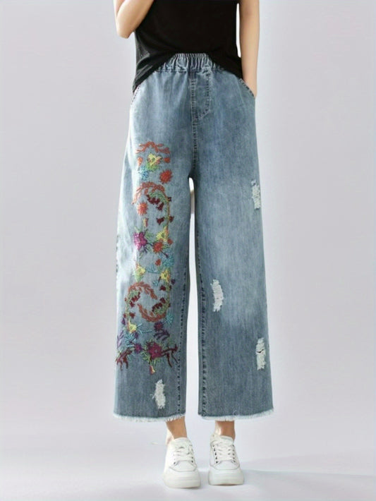 Jeans With The Right Leg Embroidered