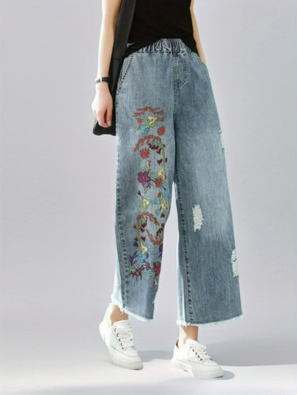 Jeans With The Right Leg Embroidered