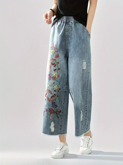 Jeans With The Right Leg Embroidered