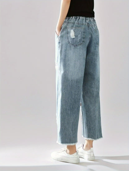 Jeans With The Right Leg Embroidered