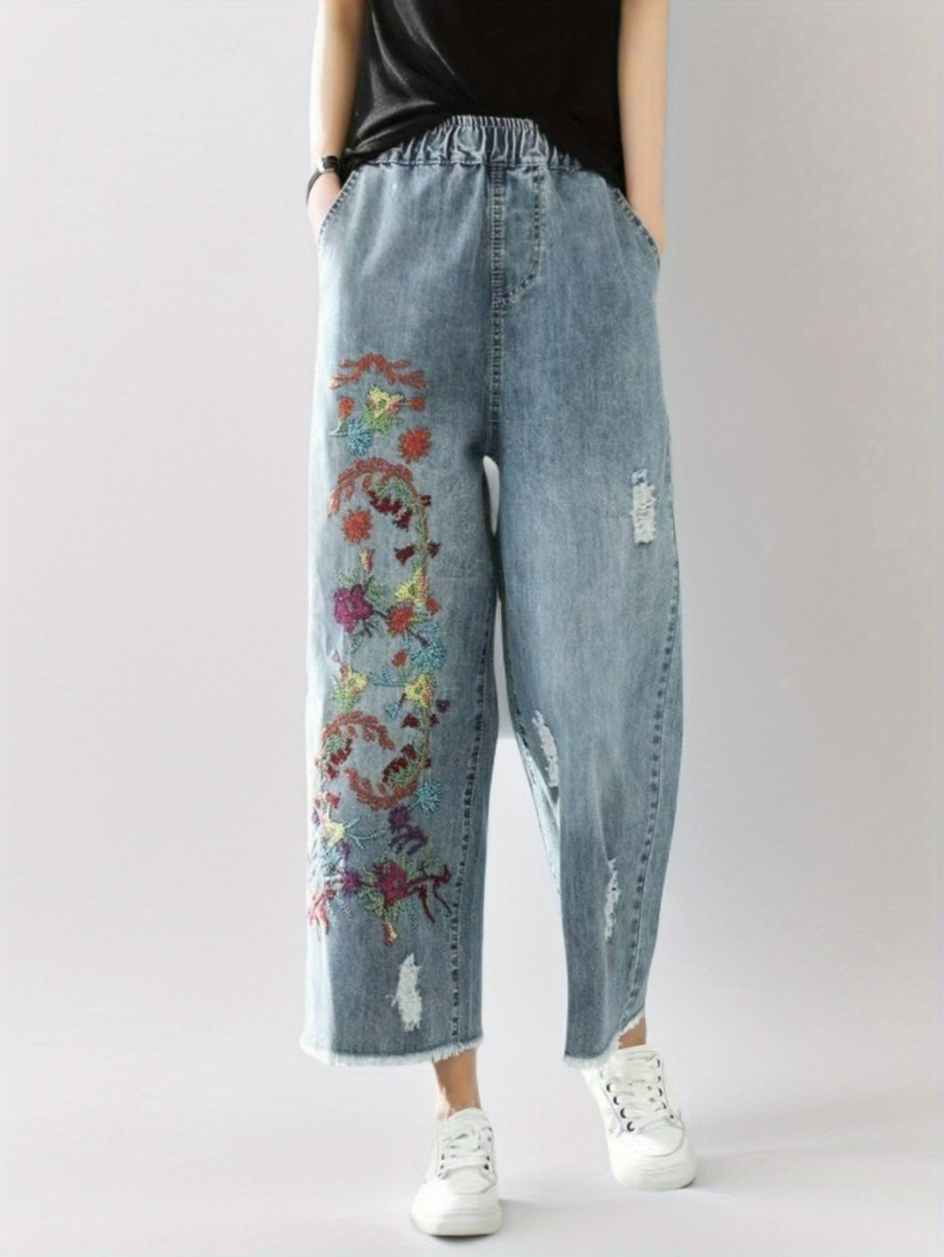 Jeans With The Right Leg Embroidered