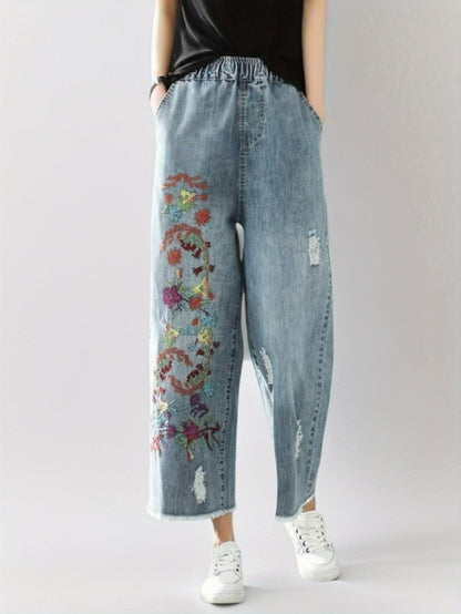 Jeans With The Right Leg Embroidered